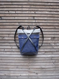 Image 1 of Waxed canvas backpack with roll to close top and leather X strap closing