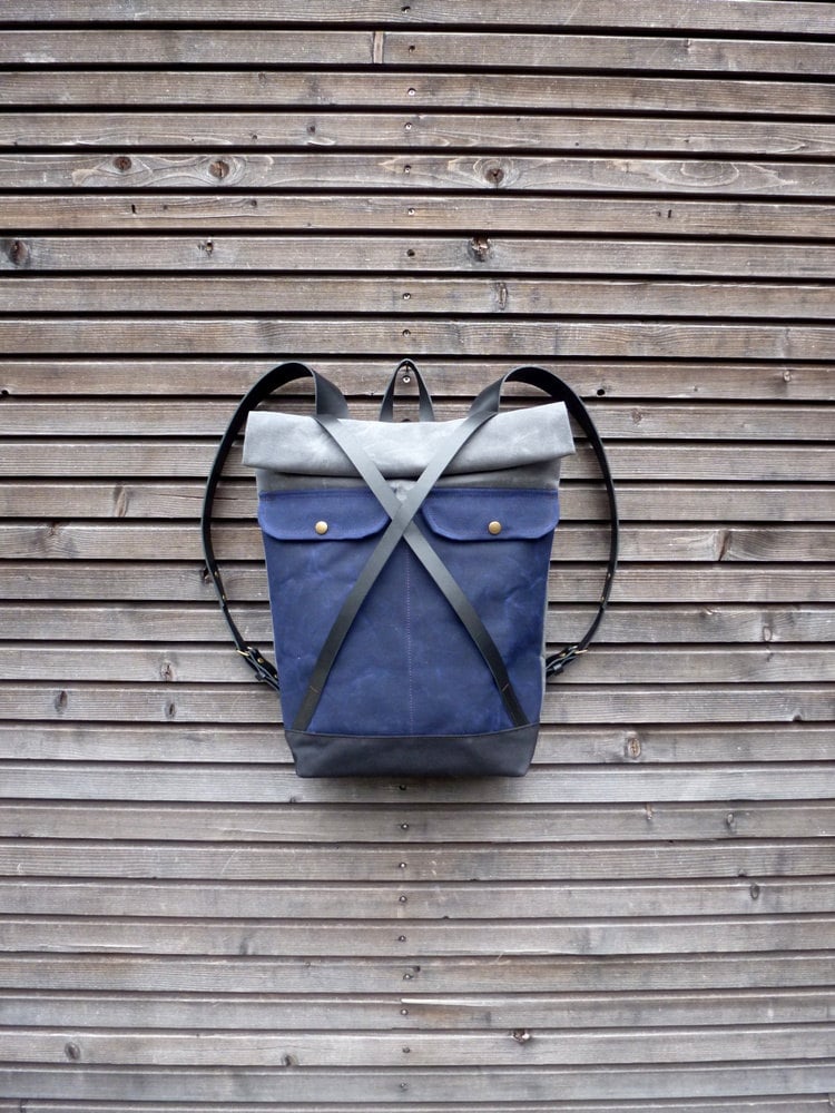 Image of Waxed canvas backpack with roll to close top and leather X strap closing