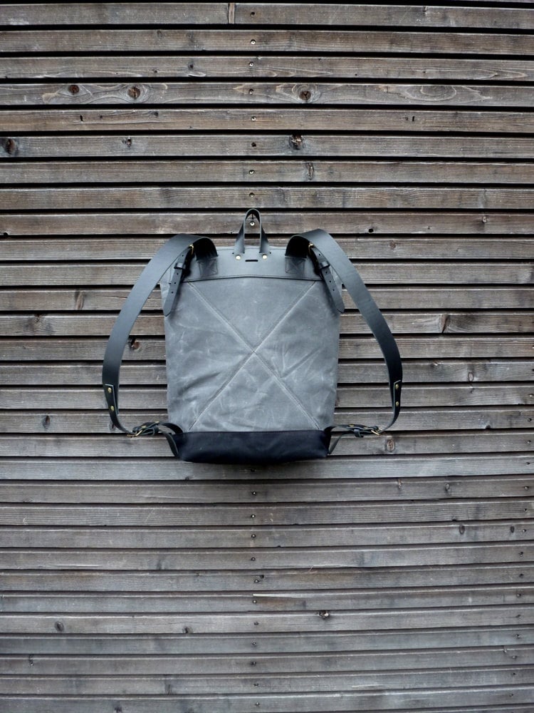 Image of Waxed canvas backpack with roll to close top and leather X strap closing