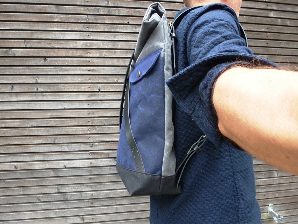 Image of Waxed canvas backpack with roll to close top and leather X strap closing