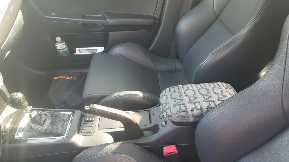 EVO x / ralliart shiftboot or  armrests