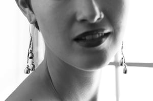 Image of Asymmetrical silver mixed brass Earrings