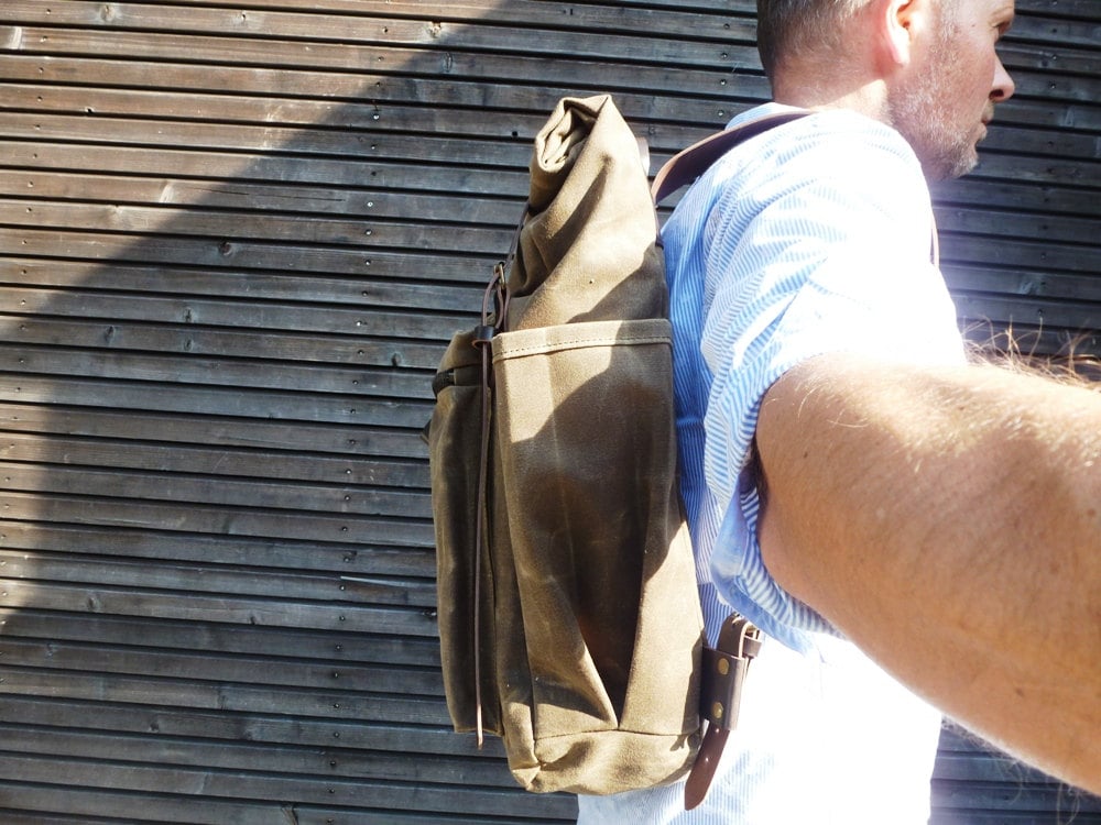 Image of Waxed canvas backpack with bottle pocket and side leather side straps