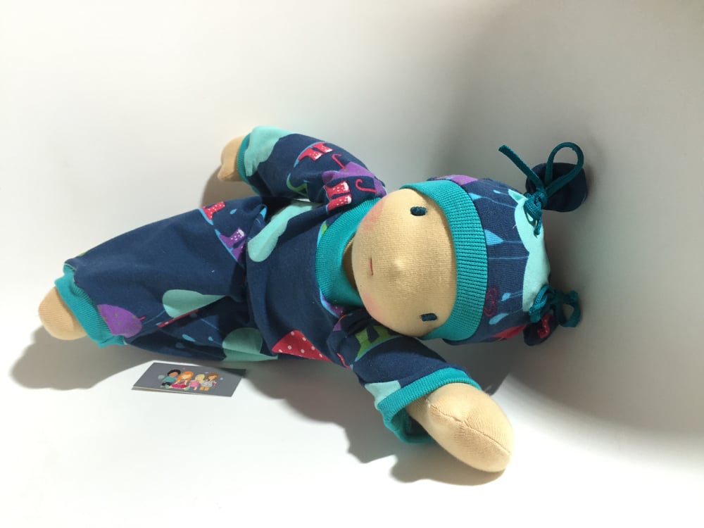 Image of Poupée Série limitée " sous la pluie " bord turquoise