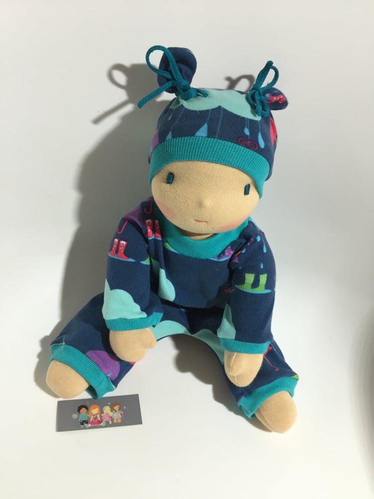 Image of Poupée Série limitée " sous la pluie " bord turquoise