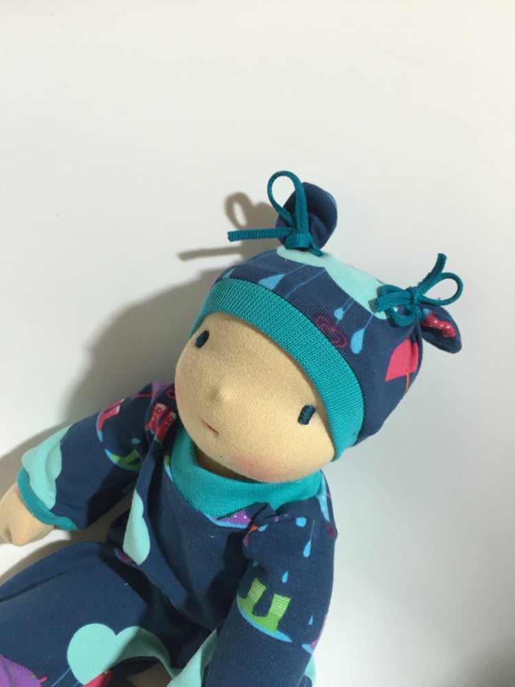 Image of Poupée Série limitée " sous la pluie " bord turquoise