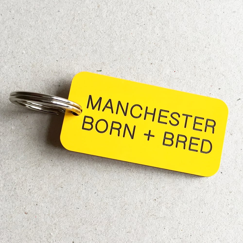 Image of Manchester Born + Bred Keyring in Yellow + Black