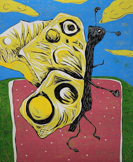 Image of Butterfly crossing the road