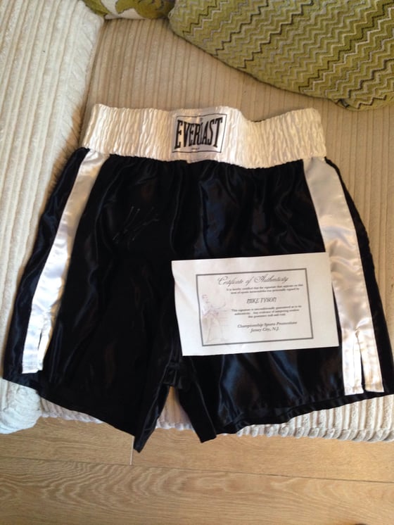 Image of Mike Tyson signed shorts, COA included.