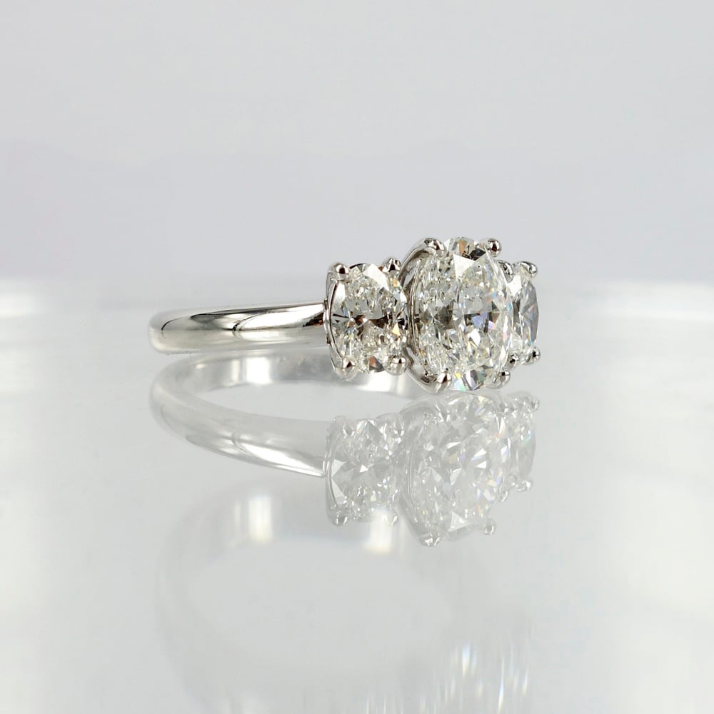 Image of 18ct White Gold Oval Diamond Trilogy Ring