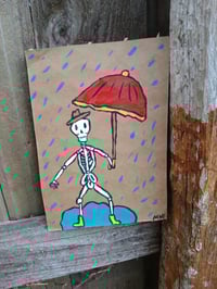 Image 1 of Skeleton In Rain