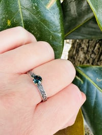 Image 8 of size 9 paisley ring with blue spinel