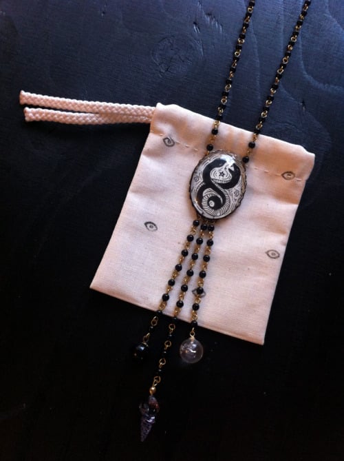 Image of Love Snakes Rosary pendant necklace
