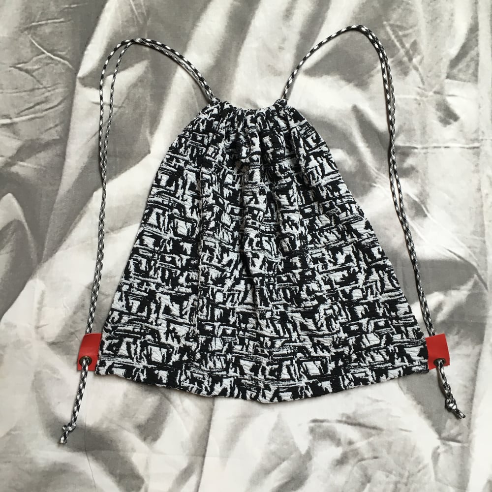 Image of Black White and Red All-Over Drawstring Backpack
