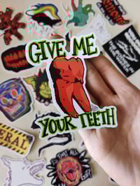 Image 2 of GIVE ME YOUR TEETH sticker