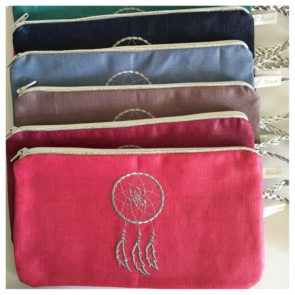 Image of Pochette longue avec lanière
