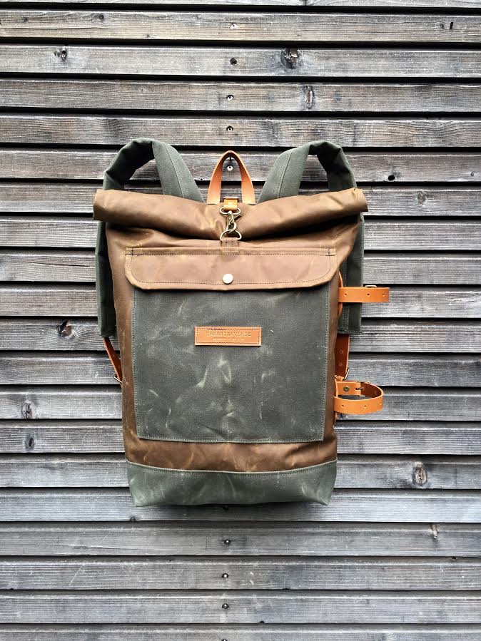 Waxed canvas backpack with detachable leather side straps and padded