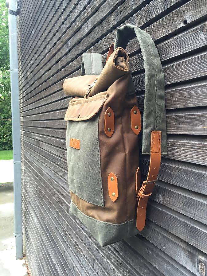 Waxed canvas backpack with detachable leather side straps and padded shoulder straps