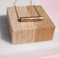 Image 1 of gold barrel necklace