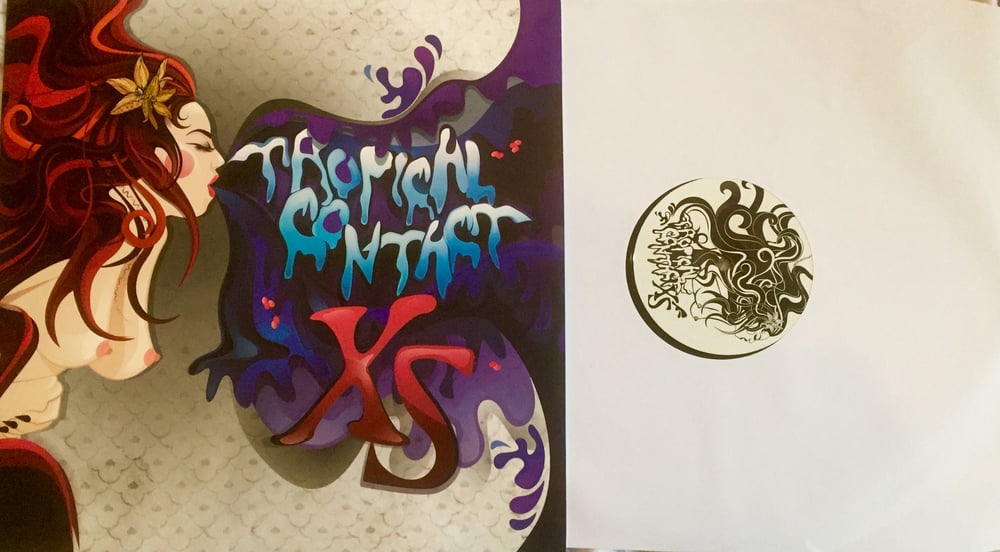 Image of XS album on vinyl
