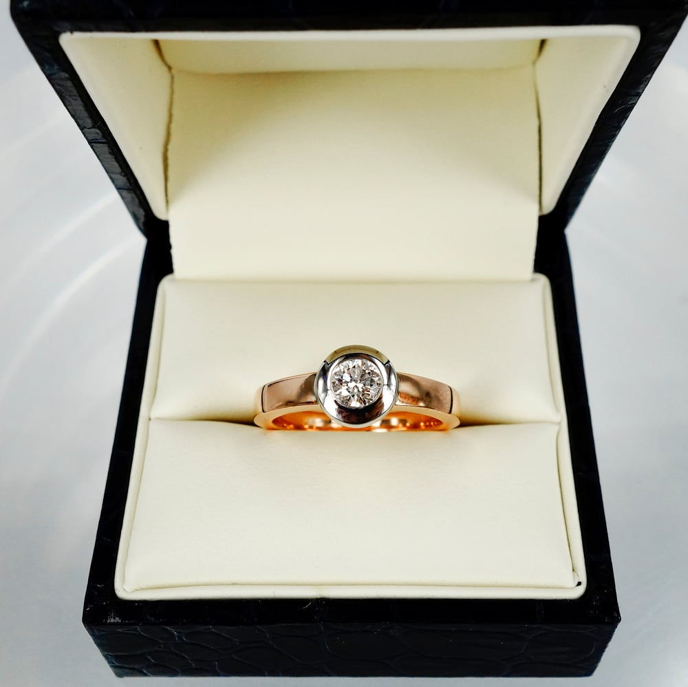 Image of 18ct White and Rose Gold Bezel Set Solitaire Diamond Ring.