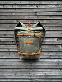Image 1 of Waxed canvas rucksack/backpack with roll up top and waxed canvas padded shoulderstraps