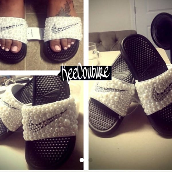 Image of Nike slides