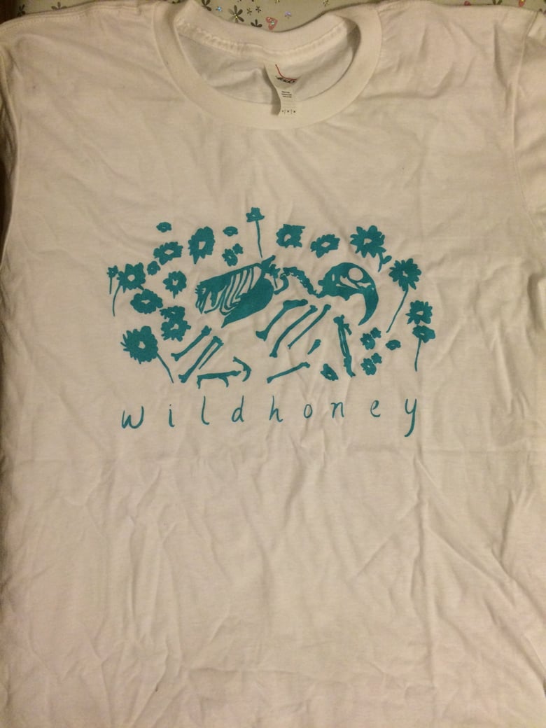 Image of bird skeleton and flowers t shirt
