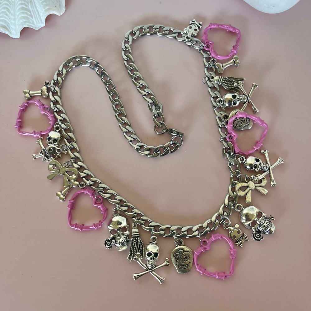 Image of One of a Kind Pink Barbed Heart, Skull, Bow necklace