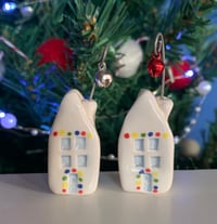 Image 1 of Christmas Houses with a Bell. 