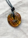 Baltic colourful Amber donut pendant with cord