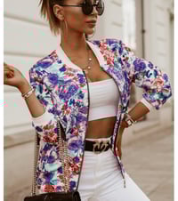Image 6 of "Petal to the Metal"
A floral bomber that’s soft in print, fierce in style 


