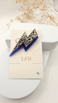 Image 1 of Broche FLASH bleu/leo