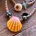 Image of Hawaiian sunrise shell necklace with Tahitian pearls 18 inch