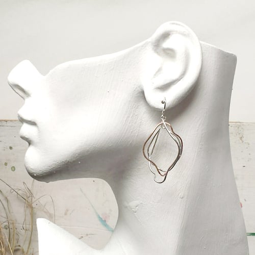 Image of Misbehaving links in sterling silver and 14kt gf