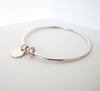 GO ROUND BANGLE IN STERLING SILVER AND 9CT ROSE GOLD