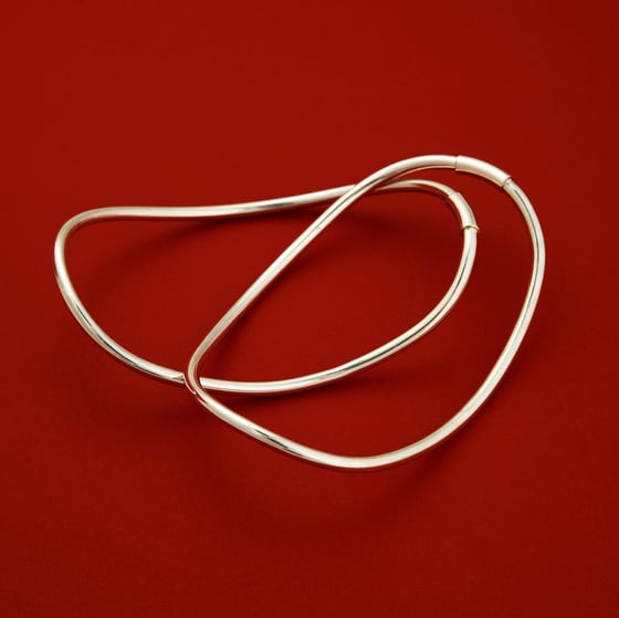Image of contoured solid silver anklet