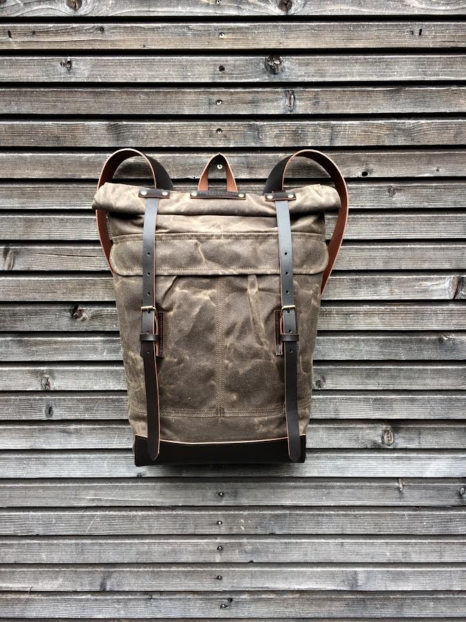 Image of Waxed canvas backpack with roll up top and leather shoulder straps COLLECTION UNISEX