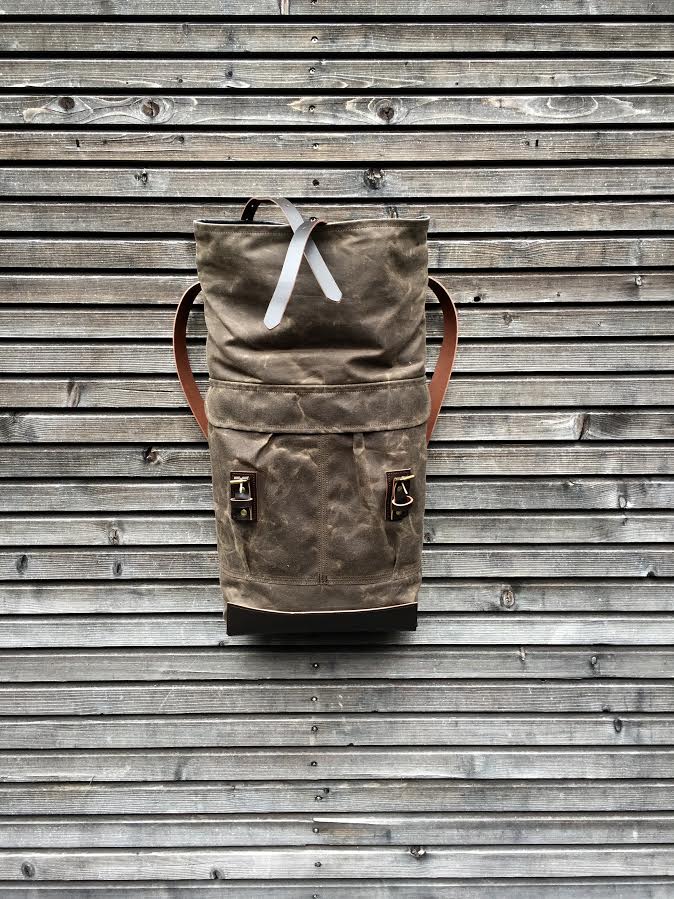Image of Waxed canvas backpack with roll up top and leather shoulder straps COLLECTION UNISEX