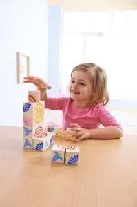 Image of Cubos de madera de puzzle de HABA La magia de las flores