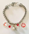 Orange Lutheran charm bracelet