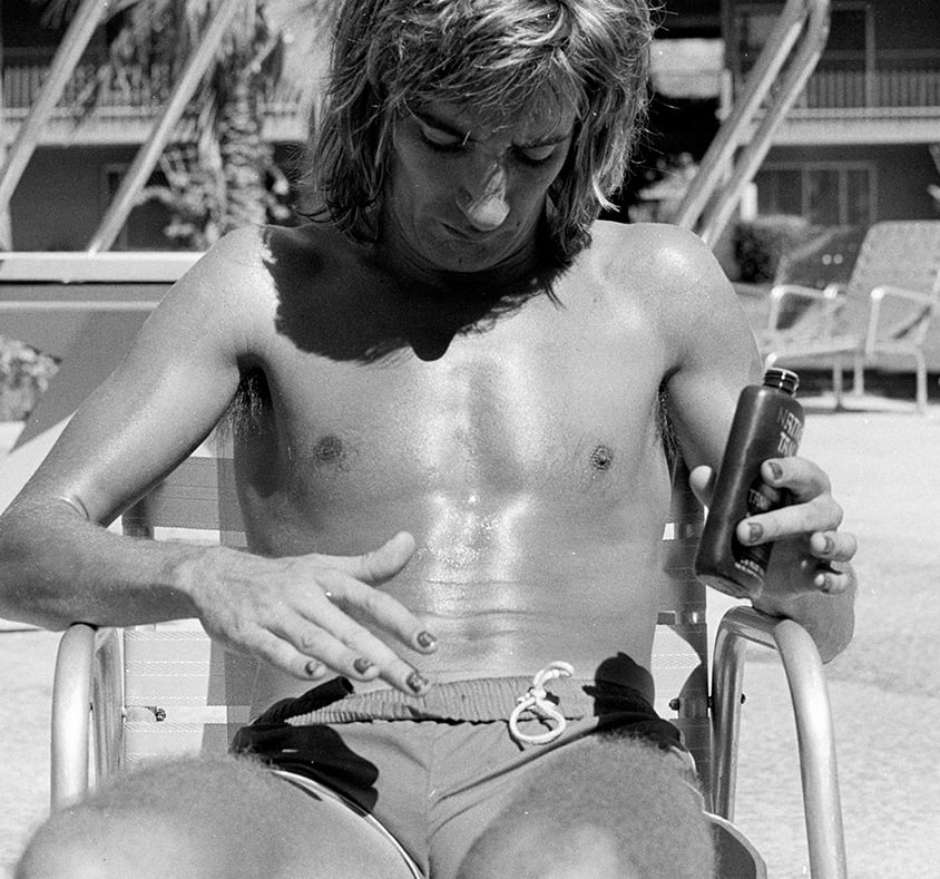 Image of Rod 'the bod' Stewart poolside in a Speedo
