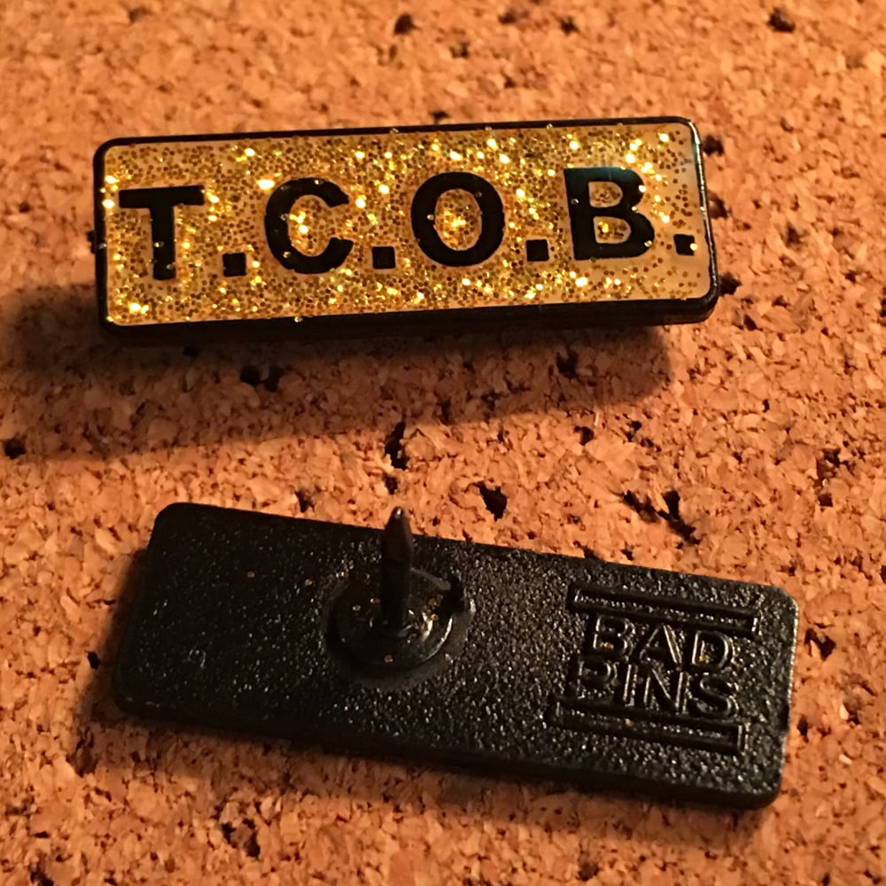 'Taking Care Of Business' Lapel Pin