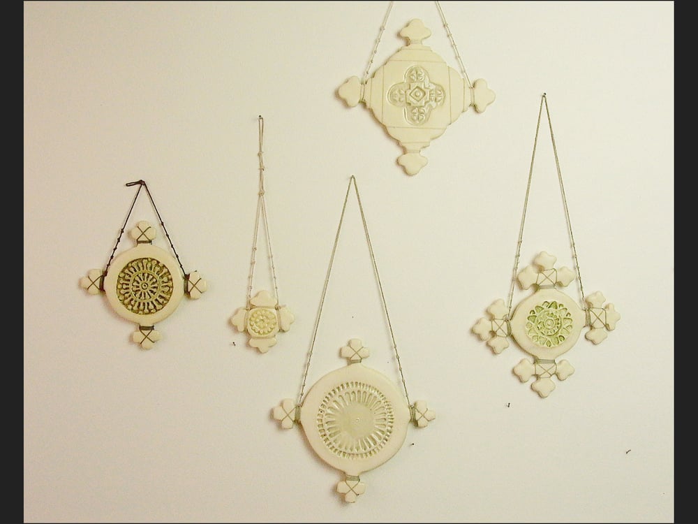 Image of set of 5 Hanging crosses 