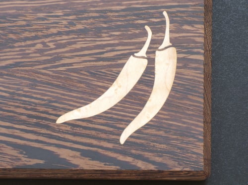 Image of Limited Edition Exotic Wood Cutting Board with Chili Pepper Inlay