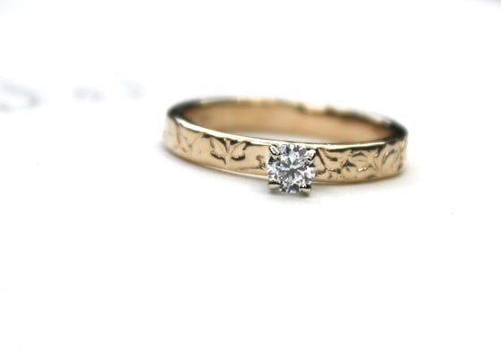Image of petite moissanite engagement ring