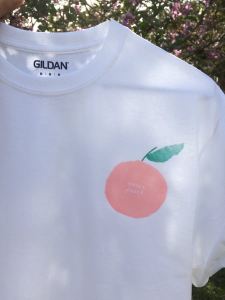 Image of peach shirt