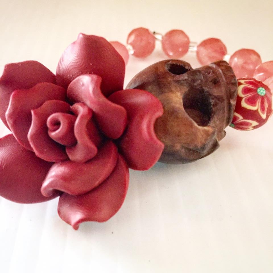 Image of Dia De Los Muertos~Wood Carved Skull with Cherry Quartz