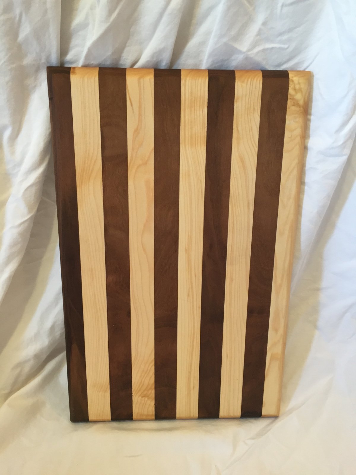 Image of Wooden striped hardwood cutting board