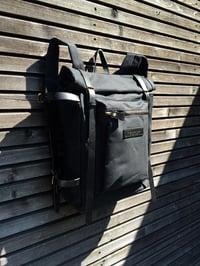 Image 2 of Waxed canvas backpack with roll to close top and zipper outside pocket